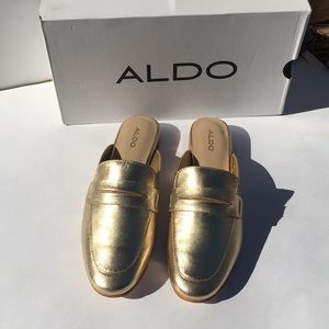 Gold ALDO slip-ons